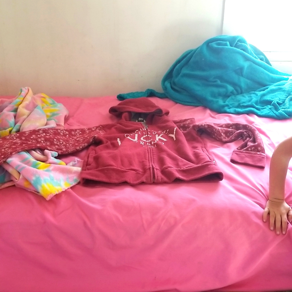 Red jacket the brand is lucky brand size is L\G\G I have two colors I have blue